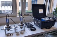 Flow-through measuring cell for determining physico-chemical parameters