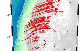 The figure shows the displacement vectors using red arrows