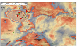 Map of northwestern Afghanistan around the earthquake area northwest of Herat. Deformations of the earth's surface are shown in bright colours - similar to a profile of contour lines. Dots mark the earthquake centres. There, ring-shaped patterns mark strong changes.