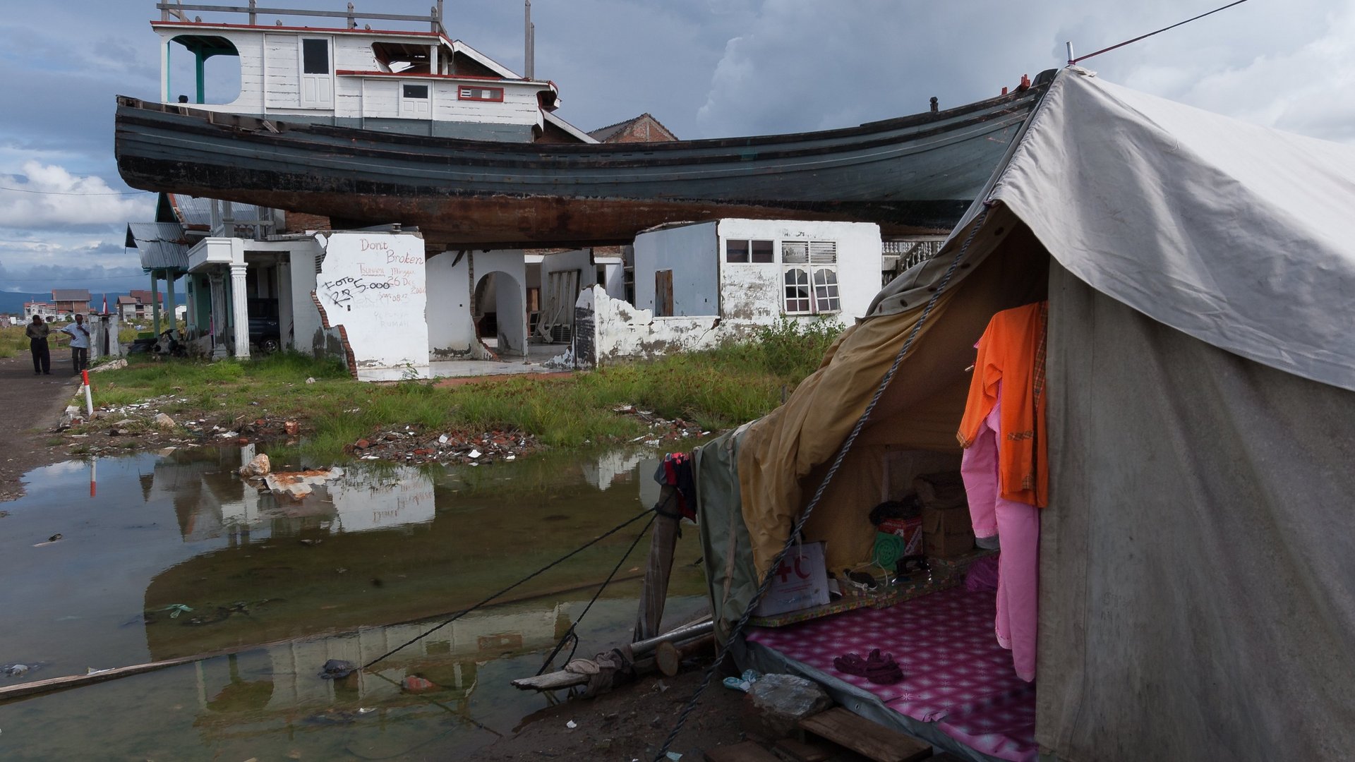 Boat on a house, months after the tsunami disaster